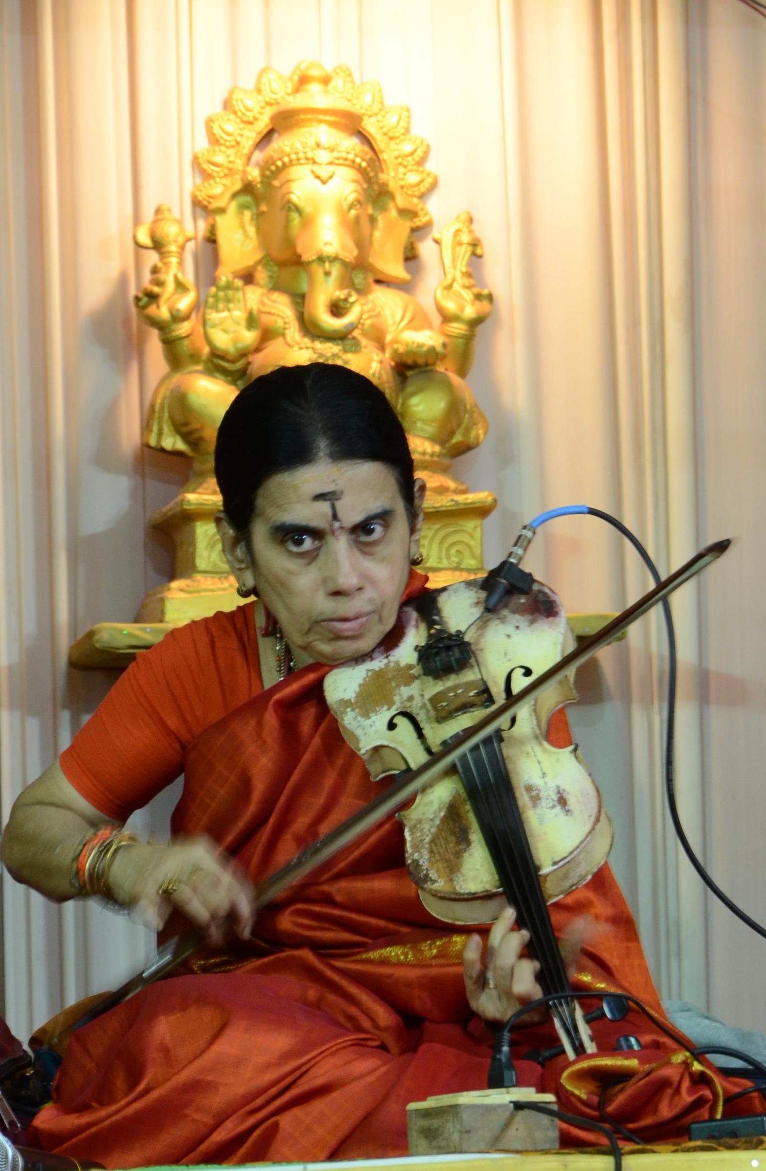 A. Kanyakumari playing violin