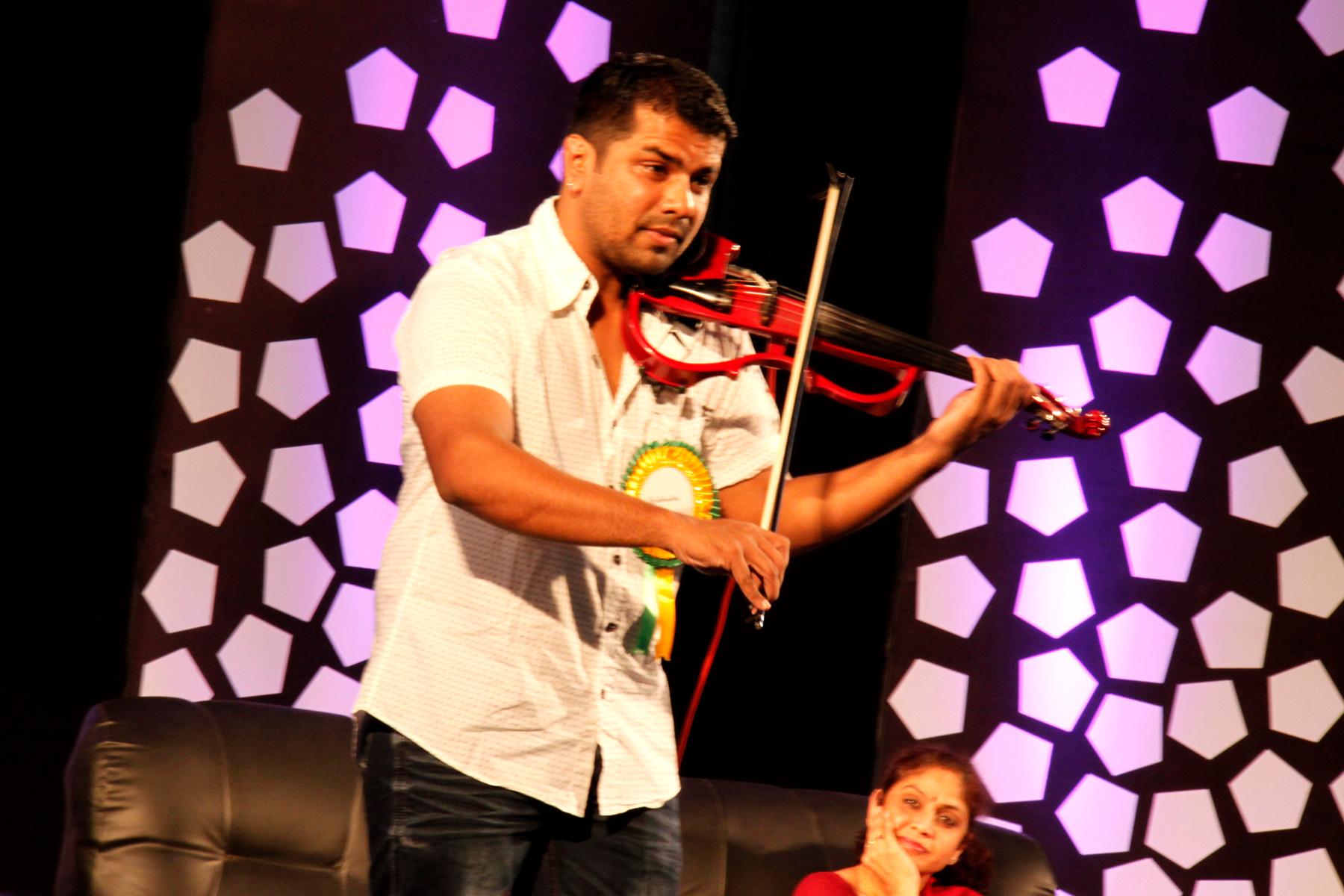 Balabhaskar performing with violin